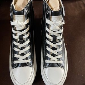 Size 41 Black leather sneakers by Bussola side zipper closure for easy wearing.